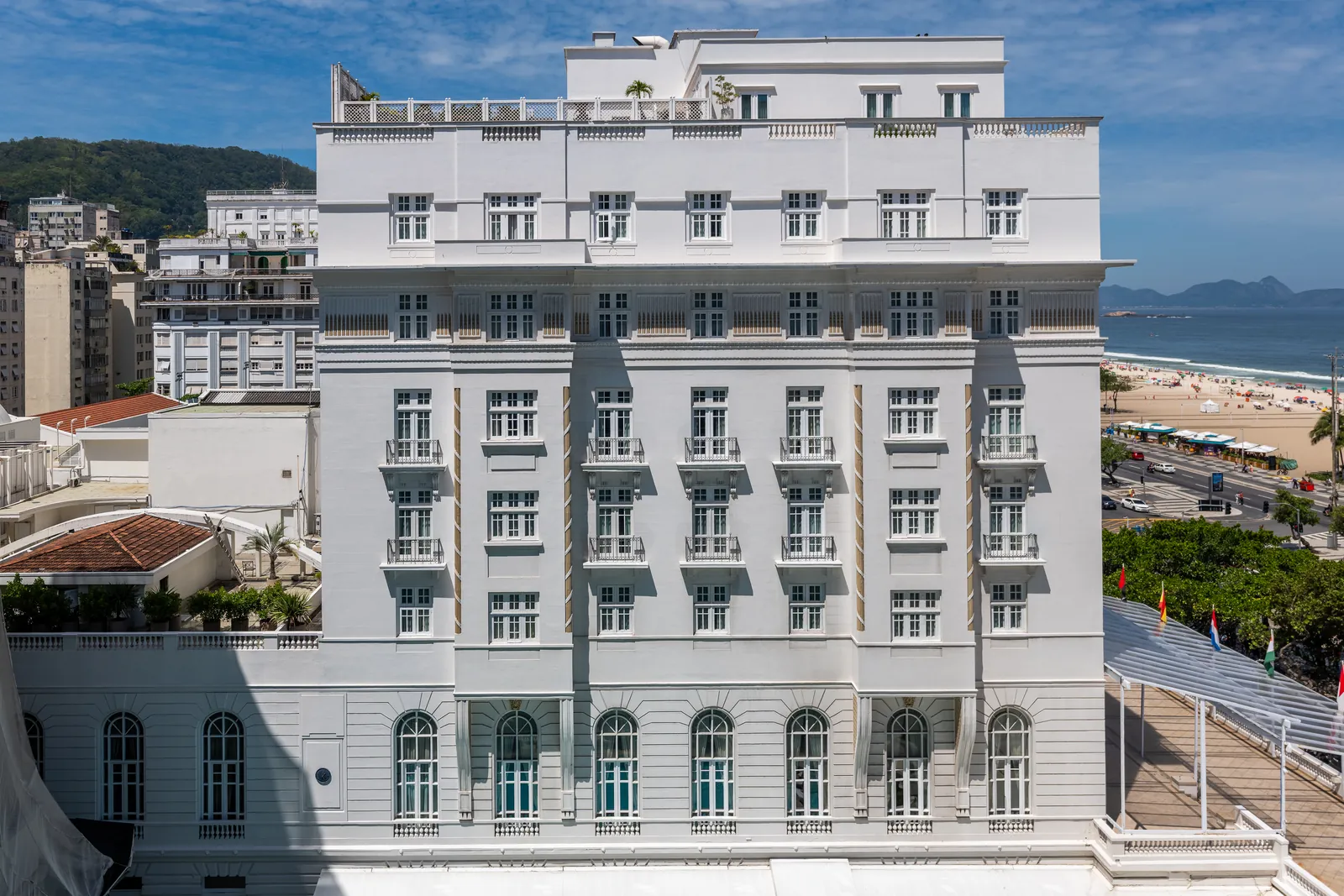 The Copacabana Palace and the seafront seen from the building, hills beyond